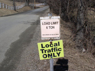 Signs on Poocham Rd saying 'LOAD LIMIT 6 TONS' and 'Local Traffic Only'