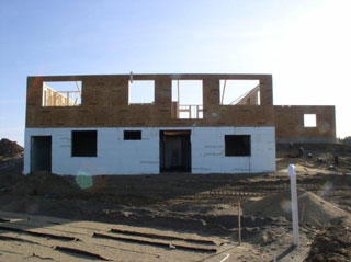 Septic field, yada yada yada. Upper floor now taking shape.