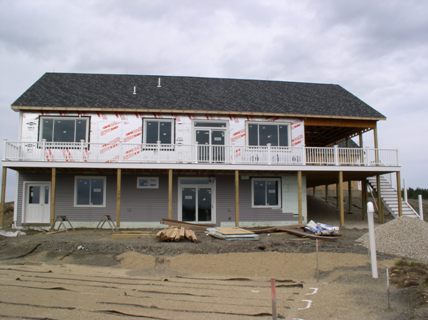 Drywall is mostly gone.  There is a door on the basement access.  Siding has been added to part of the down stairs. Septic...