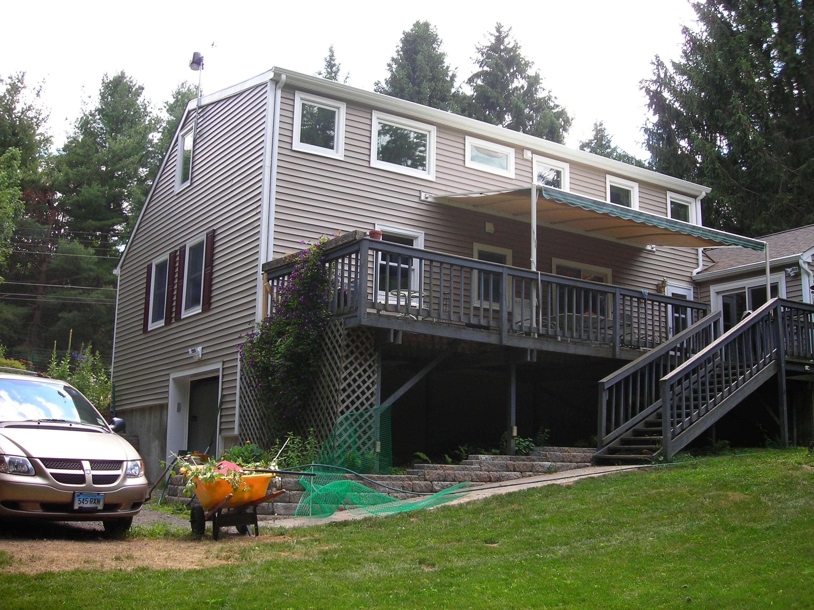 The view of the house from the back with it's new landscaping